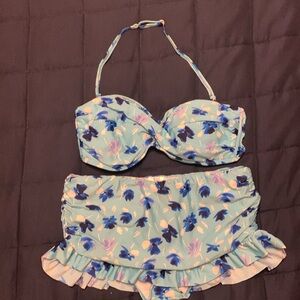 2 pc skirted swimsuit. Both pieces are Large.  Blue flowered print.
